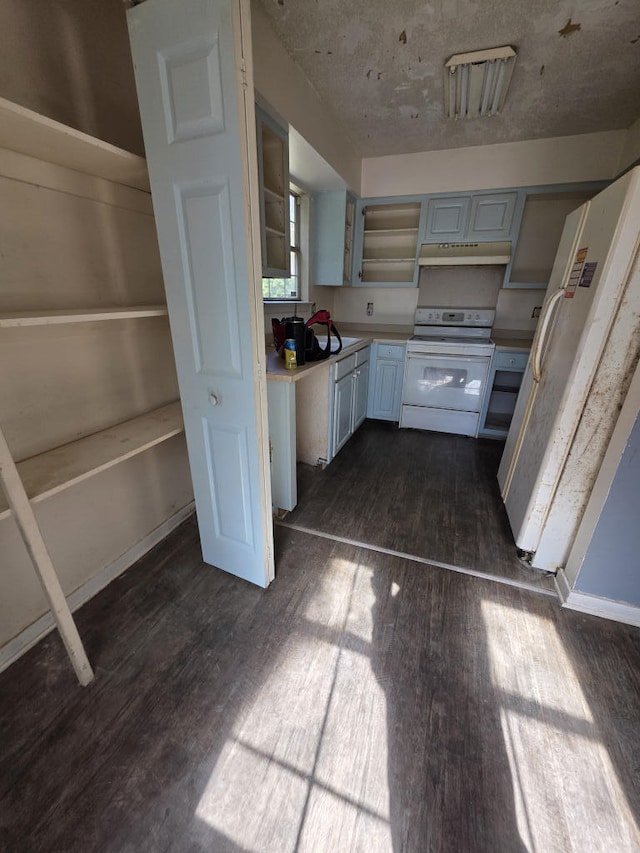 kitchen with white appliances, baseboards, dark wood-style floors, light countertops, and under cabinet range hood