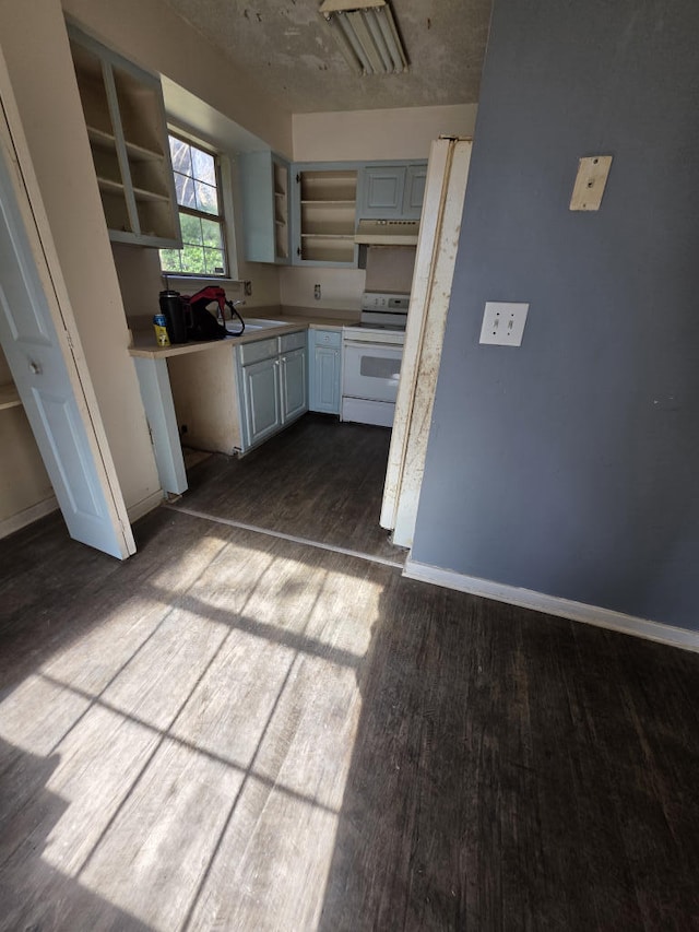 kitchen with white range with electric stovetop, baseboards, dark wood-type flooring, open shelves, and a sink