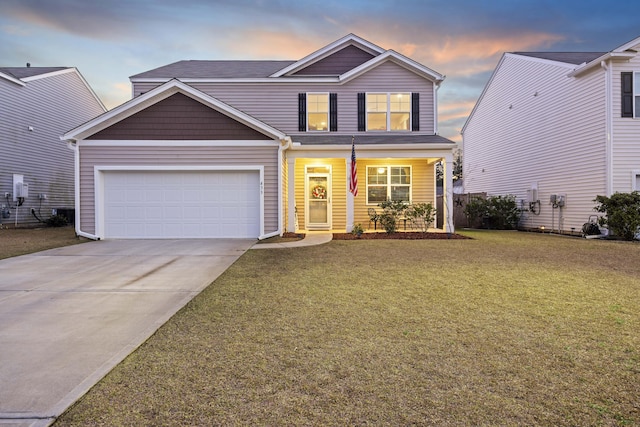 traditional-style house with a garage, a lawn, and driveway