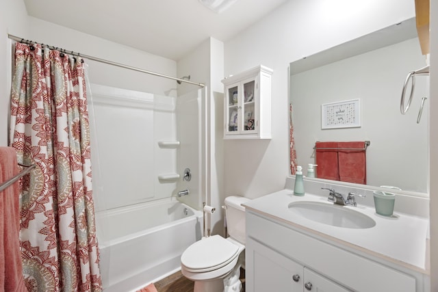 full bathroom with visible vents, shower / tub combo, vanity, and toilet