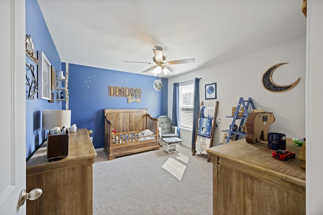 bedroom with carpet floors, a ceiling fan, and baseboards