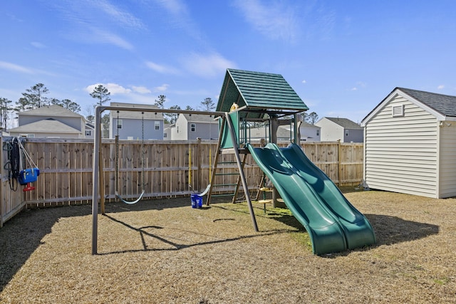 view of playground featuring a fenced backyard