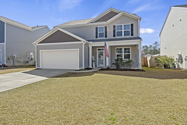 view of front of house featuring driveway, a front lawn, and an attached garage