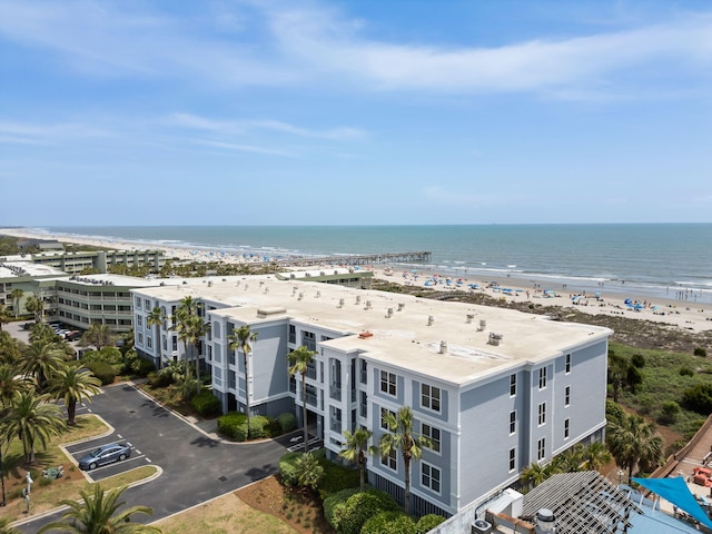 aerial view featuring a view of the beach and a water view