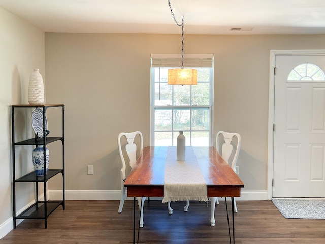 6 Littlefield St, Inman, SC 29349 - dining area with plenty of natural light, wood finished floors, and baseboards