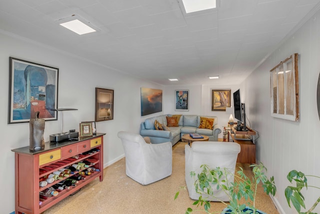 living room with carpet floors and ornamental molding