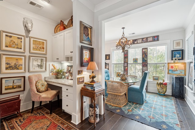 office with visible vents, ornamental molding, dark wood-style flooring, and a chandelier