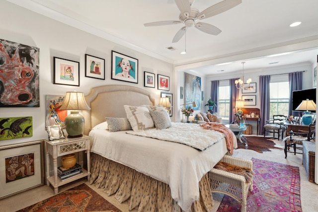 bedroom featuring recessed lighting, ceiling fan with notable chandelier, visible vents, and ornamental molding