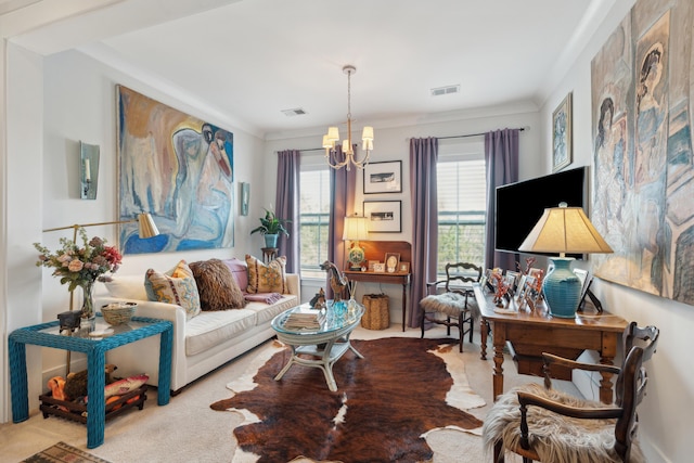 carpeted living room featuring visible vents, an inviting chandelier, and ornamental molding