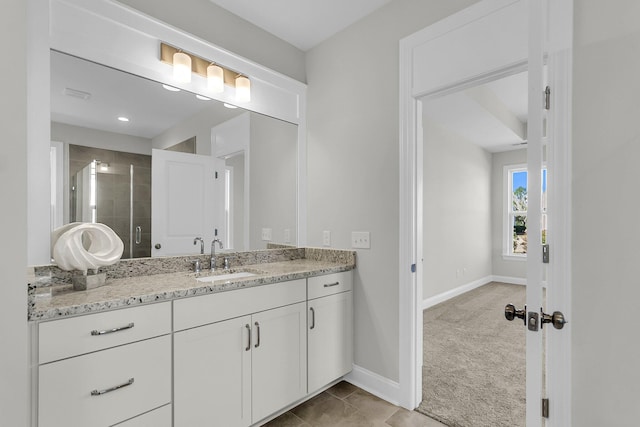 bathroom featuring vanity and walk in shower