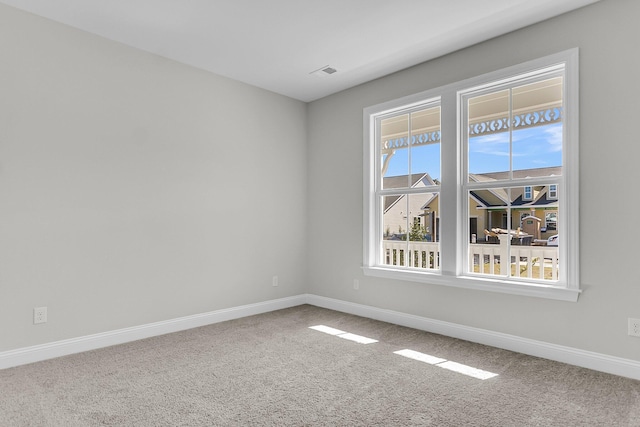 spare room with carpet flooring