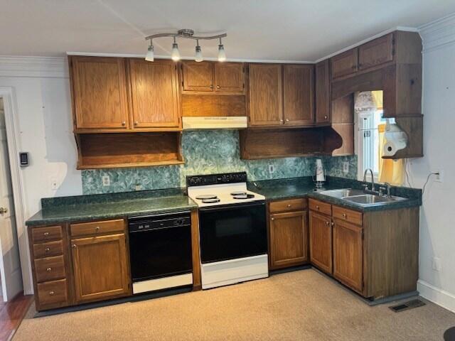 1089 Charles Dr, Manning, SC 29102 - kitchen featuring range with electric stovetop, dishwasher, a sink, under cabinet range hood, and dark countertops