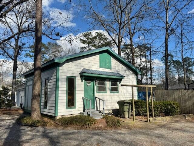 1089 Charles Dr, Manning, SC 29102 - view of front of property featuring entry steps, asphalt driveway, and an attached garage