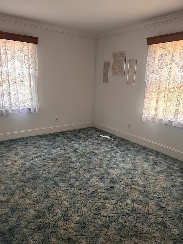 1089 Charles Dr, Manning, SC 29102 - spare room with crown molding, baseboards, and dark carpet
