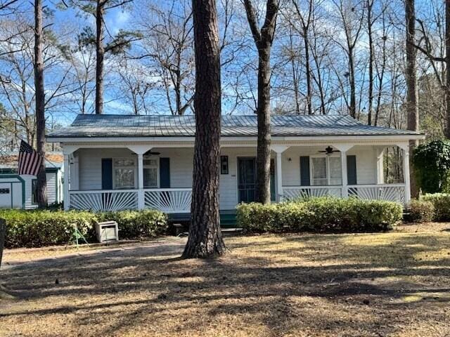 1089 Charles Dr, Manning, SC 29102 - view of front of house with a porch, ceiling fan, and metal roof
