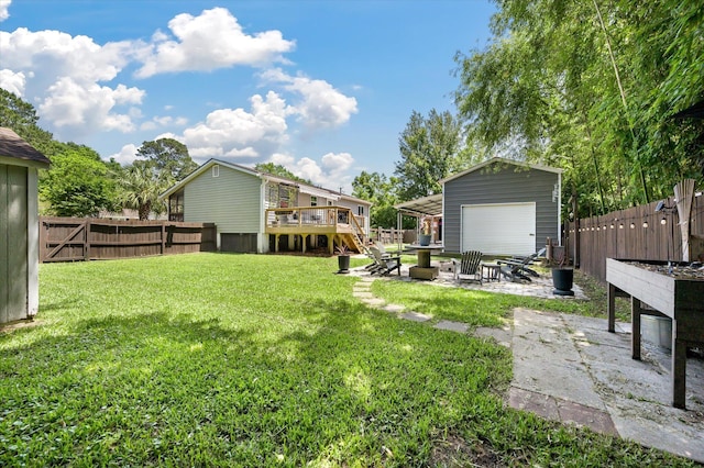 view of yard featuring a fire pit, a patio, and an outdoor structure