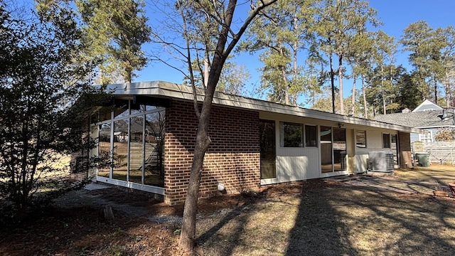 view of property exterior featuring central air condition unit