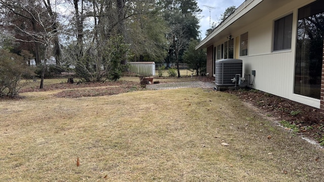 view of yard with central AC