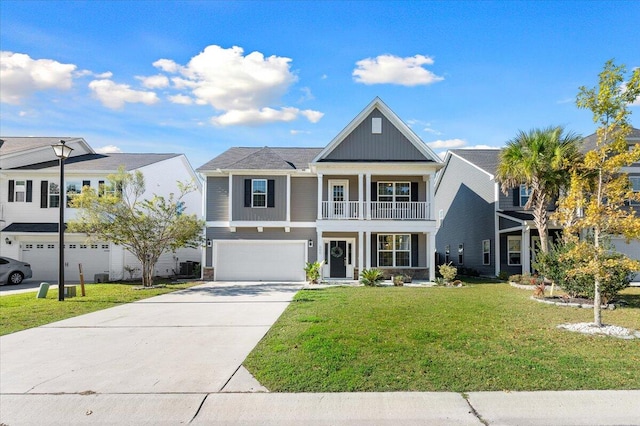 view of front facade featuring a front yard and a garage