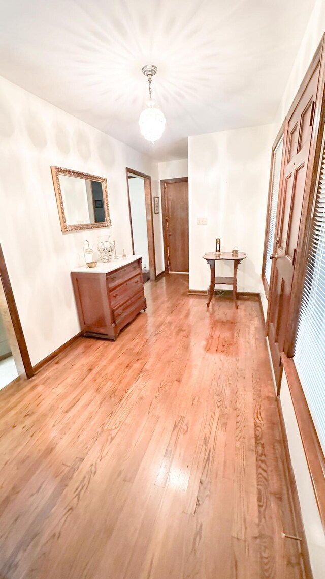 1807 Perch Rd, Moncks Corner, SC 29461 - full bath with wood finished floors, vanity, and a chandelier