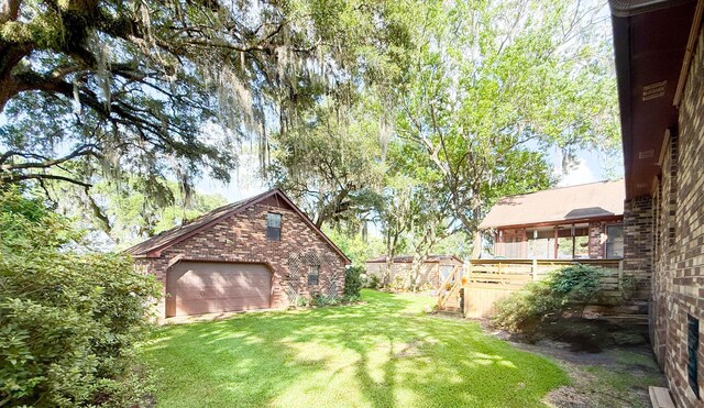 1807 Perch Rd, Moncks Corner, SC 29461 - view of green lawn with a detached garage