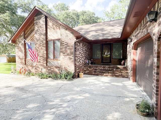 1807 Perch Rd, Moncks Corner, SC 29461 - view of exterior entry with brick siding and a shingled roof