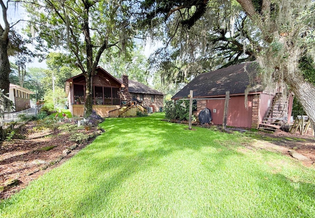 1807 Perch Rd, Moncks Corner, SC 29461 - view of green lawn featuring stairs and a sunroom