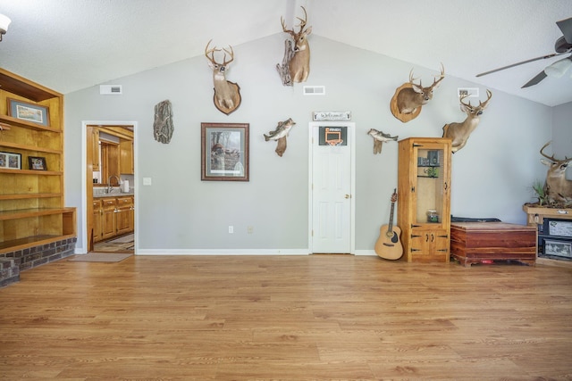 208 Mini Farm Rd, Bonneau, SC 29431 - dining area featuring light wood-type flooring, vaulted ceiling, and ceiling fan