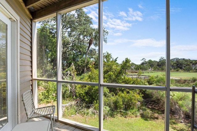 2473 High Hammock Rd, Seabrook Island, SC 29455 - unfurnished sunroom with view of scattered trees and plenty of natural light