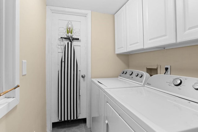 2473 High Hammock Rd, Seabrook Island, SC 29455 - laundry area featuring washer and clothes dryer, cabinet space, and tile patterned floors