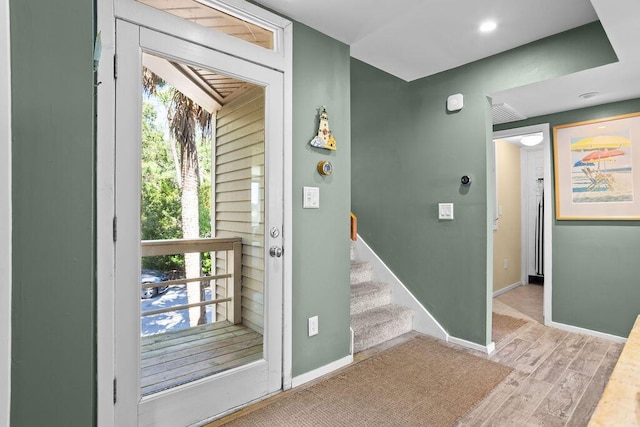2473 High Hammock Rd, Seabrook Island, SC 29455 - foyer entrance featuring wood finished floors, baseboards, and stairway