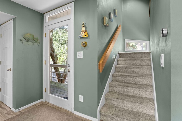 2473 High Hammock Rd, Seabrook Island, SC 29455 - foyer entrance featuring stairway, healthy amount of natural light, and baseboards