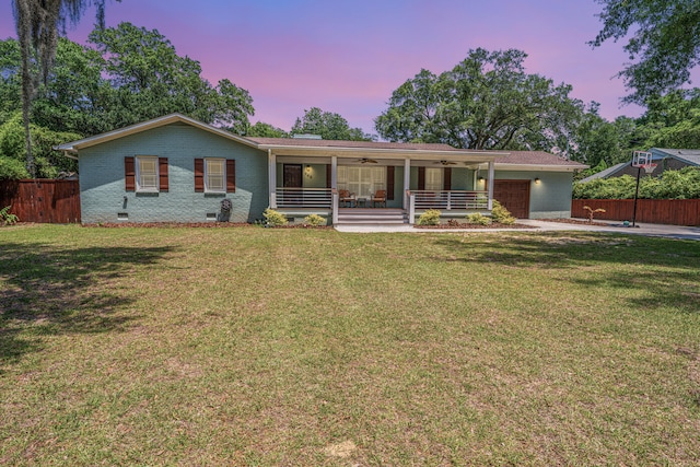 762 Swanson Ave, Charleston, SC 29412 - ranch-style home with a ceiling fan, covered porch, crawl space, a garage, and brick siding