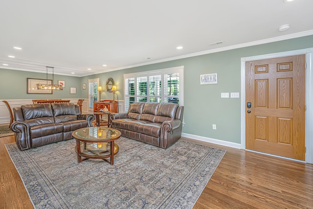 762 Swanson Ave, Charleston, SC 29412 - living room featuring wood finished floors, crown molding, recessed lighting, and a chandelier