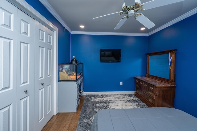 762 Swanson Ave, Charleston, SC 29412 - bedroom with wood finished floors, a closet, crown molding, recessed lighting, and ceiling fan