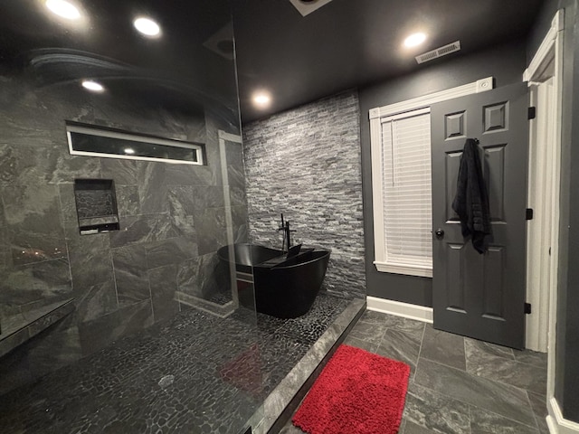 762 Swanson Ave, Charleston, SC 29412 - full bath with a freestanding tub, a tile shower, and marble finish flooring
