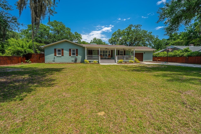 762 Swanson Ave, Charleston, SC 29412 - single story home with ceiling fan, a garage, covered porch, concrete driveway, and brick siding