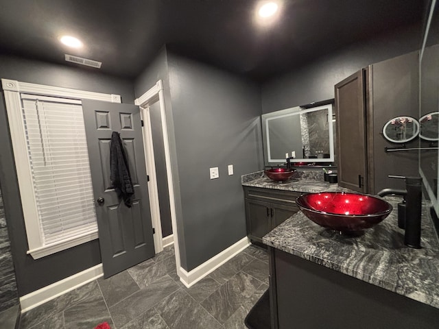 762 Swanson Ave, Charleston, SC 29412 - full bath with vanity and baseboards