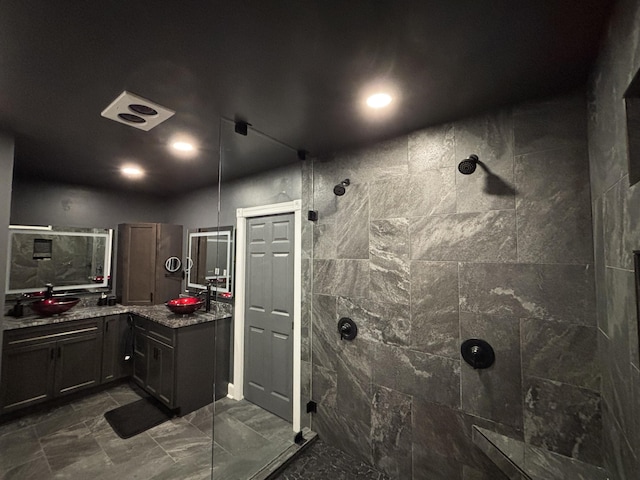 762 Swanson Ave, Charleston, SC 29412 - full bathroom featuring a tile shower, vanity, and marble look tile flooring