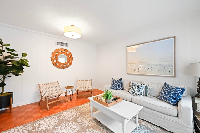 living room with wood walls and light parquet floors