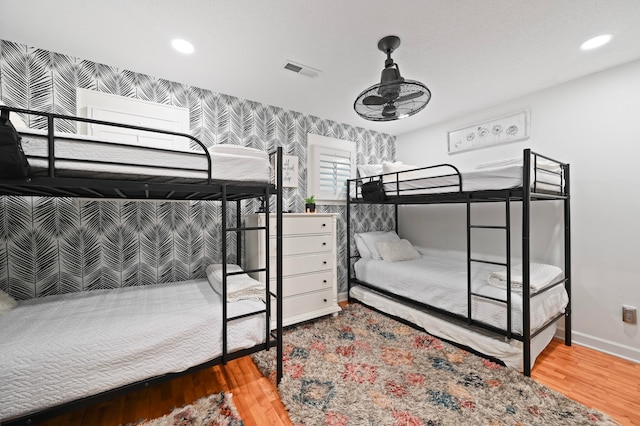 bedroom featuring hardwood / wood-style floors