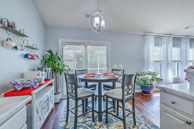 210 Delafield Dr, Summerville, SC 29483 - dining area with dark wood-style flooring and a textured ceiling