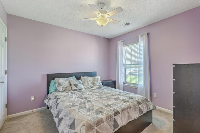 210 Delafield Dr, Summerville, SC 29483 - bedroom featuring light colored carpet, baseboards, a textured ceiling, and ceiling fan