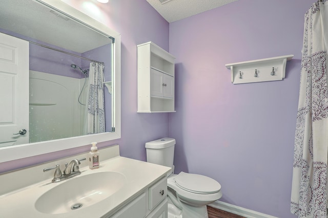 210 Delafield Dr, Summerville, SC 29483 - bathroom with vanity, toilet, a textured ceiling, wood finished floors, and curtained shower
