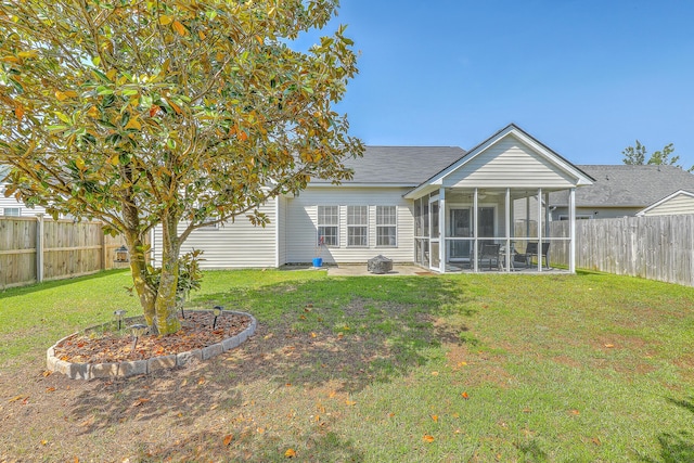 210 Delafield Dr, Summerville, SC 29483 - rear view of house with a sunroom, a patio area, and a shingled roof