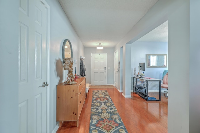 210 Delafield Dr, Summerville, SC 29483 - entrance foyer with light wood-type flooring, baseboards, and a textured ceiling