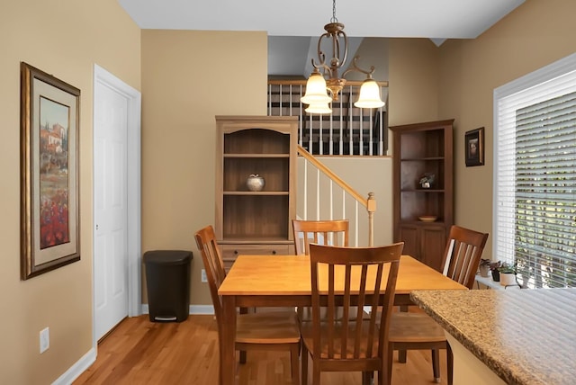 652 Spinner Cir, Mount Pleasant, SC 29464 - dining room with a chandelier and light wood-style floors