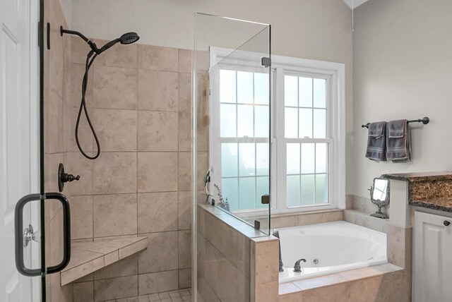 652 Spinner Cir, Mount Pleasant, SC 29464 - bathroom featuring a jetted tub, a stall shower, and vanity