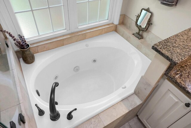 652 Spinner Cir, Mount Pleasant, SC 29464 - bathroom with a tub with jets