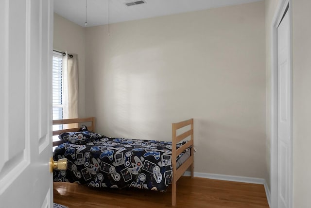 652 Spinner Cir, Mount Pleasant, SC 29464 - bedroom with wood finished floors and baseboards